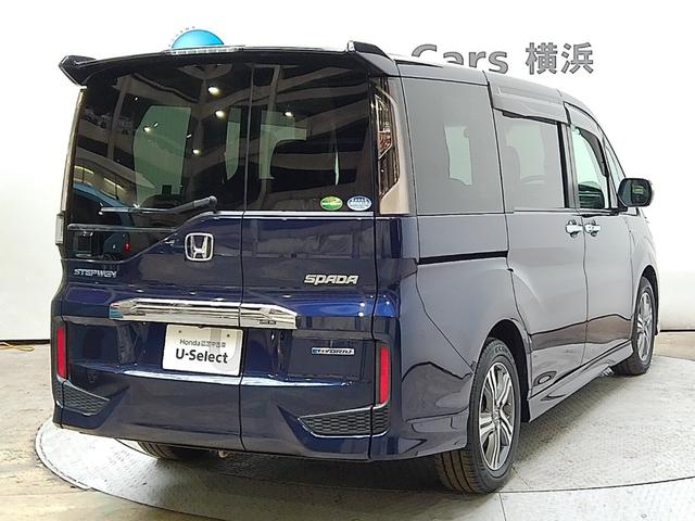 ステップワゴンスパーダ スパーダハイブリッドＧホンダセンシング　７人　後席モニター　メモリーナビ　ＥＴＣ　純正アルミ　ドアバイザー　ホンダセンシング　フルセグ　オートライト　Ｂｌｕｅｔｏｏｔｈオーディオ　サウンドコンテナ　ＣＭＢＳ　ＬＫＡＳ　リヤカメラ　スマキー（4枚目）