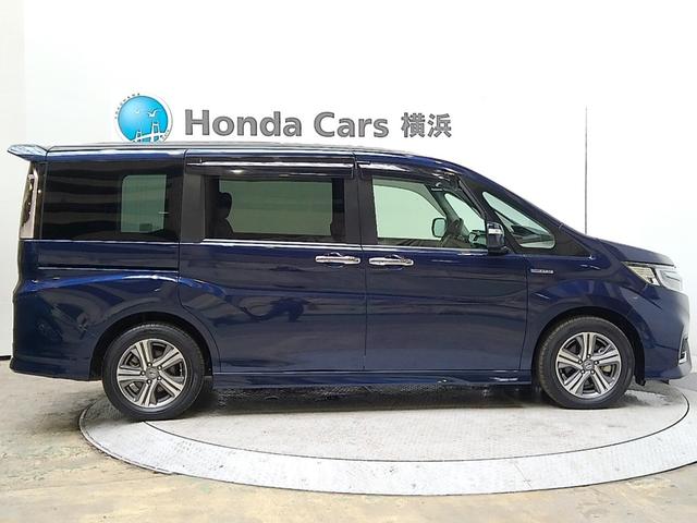 ステップワゴンスパーダ スパーダハイブリッドＧホンダセンシング　７人　後席モニター　メモリーナビ　ＥＴＣ　純正アルミ　ドアバイザー　ホンダセンシング　フルセグ　オートライト　Ｂｌｕｅｔｏｏｔｈオーディオ　サウンドコンテナ　ＣＭＢＳ　ＬＫＡＳ　リヤカメラ　スマキー（7枚目）
