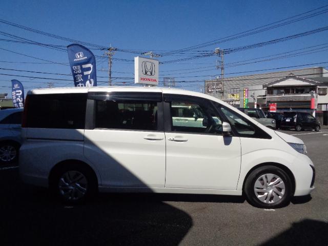 ステップワゴン Ｇホンダセンシング　整備記録簿　ワンオーナー車　スマ－トキ－　クルコン　アイスト　３列シート　パワーウインドウ　イモビ　Ｒカメラ　ＶＳＡ　ＴＶナビ　ＤＶＤ　ＥＴＣ車載器　パワーステアリング　地デジ（19枚目）