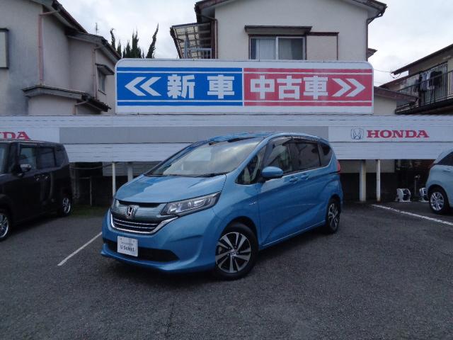 フリードハイブリッド ハイブリッド・Ｇホンダセンシング　軽減ブレーキ　キーフリーシステム　１オ－ナ－　記録簿　ＤＶＤ再生可能　ＥＣＯＮ　後カメラ　Ａクルーズ　地デジフルセグＴＶ　ＬＥＤヘッドランプ　横滑防止　３列シート（21枚目）
