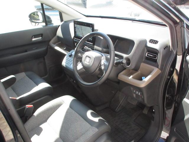 フリード e:HEVエアーEX 当社デモカー HondaSENSING 全周囲カメラ リアカメラ ETC 純正アルミ パーキングセンサー LED シートヒーター BTオーディオ USB 禁煙車 ブラインドスポット フルセグTV(7枚目)