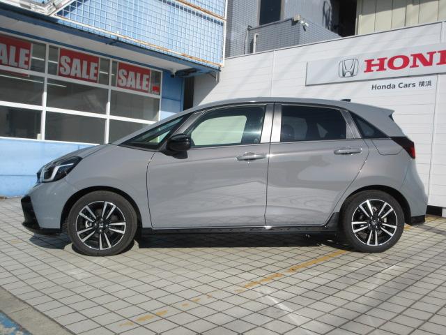 フィット ｅ：ＨＥＶＲＳ　当社デモカー　ＨｏｎｄａＳＥＮＳＩＮＧ　メモリーナビ　リアカメラ　ＥＴＣ　純正アルミ　レーダークルーズ　エアバッグ　ナビ＆ＴＶ　パワーウィンドウ　助手席エアバッグ　元試乗車　レーンアシスト　禁煙（5枚目）