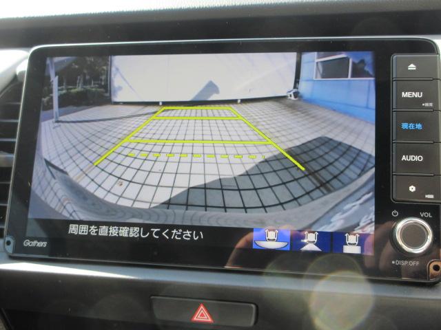 フィット ｅ：ＨＥＶＲＳ　当社デモカー　ＨｏｎｄａＳＥＮＳＩＮＧ　メモリーナビ　リアカメラ　ＥＴＣ　純正アルミ　レーダークルーズ　エアバッグ　ナビ＆ＴＶ　パワーウィンドウ　助手席エアバッグ　元試乗車　レーンアシスト　禁煙（9枚目）