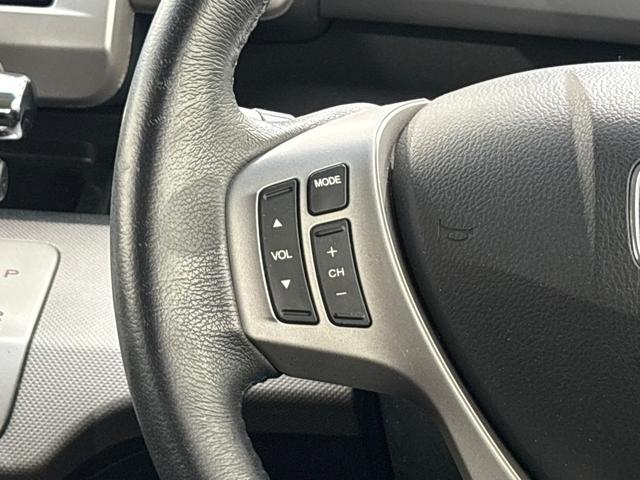 フリードハイブリッド ジャストセレクション 禁煙車 ワンオーナー 純正メモリーナビ リア席モニター リアカメラ 両側電動スライドドア 純正アルミホイール スマートキー ETC コンフォートビューパッケージ クルコン 本革巻ステアリングホイール(19枚目)