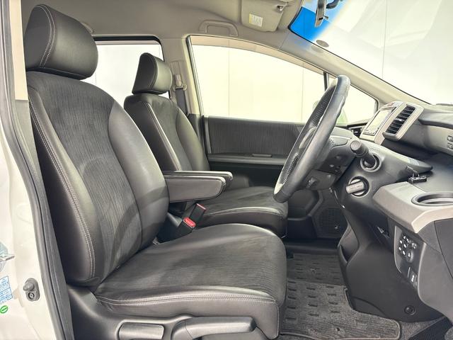 フリードハイブリッド ジャストセレクション 禁煙車 ワンオーナー 純正メモリーナビ リア席モニター リアカメラ 両側電動スライドドア 純正アルミホイール スマートキー ETC コンフォートビューパッケージ クルコン 本革巻ステアリングホイール(27枚目)