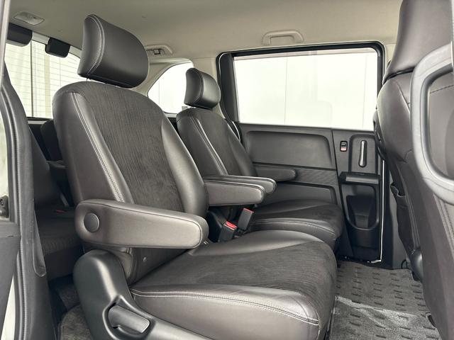 フリードハイブリッド ジャストセレクション 禁煙車 ワンオーナー 純正メモリーナビ リア席モニター リアカメラ 両側電動スライドドア 純正アルミホイール スマートキー ETC コンフォートビューパッケージ クルコン 本革巻ステアリングホイール(31枚目)