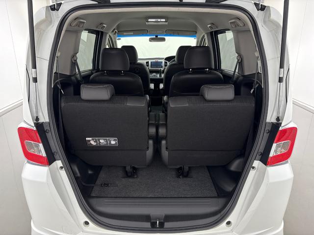 フリードハイブリッド ジャストセレクション 禁煙車 ワンオーナー 純正メモリーナビ リア席モニター リアカメラ 両側電動スライドドア 純正アルミホイール スマートキー ETC コンフォートビューパッケージ クルコン 本革巻ステアリングホイール(33枚目)