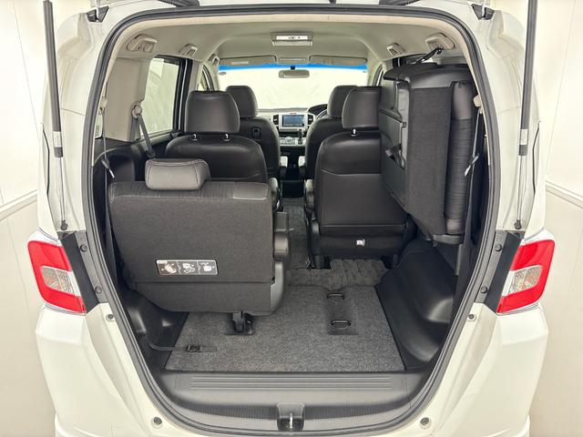 フリードハイブリッド ジャストセレクション 禁煙車 ワンオーナー 純正メモリーナビ リア席モニター リアカメラ 両側電動スライドドア 純正アルミホイール スマートキー ETC コンフォートビューパッケージ クルコン 本革巻ステアリングホイール(34枚目)