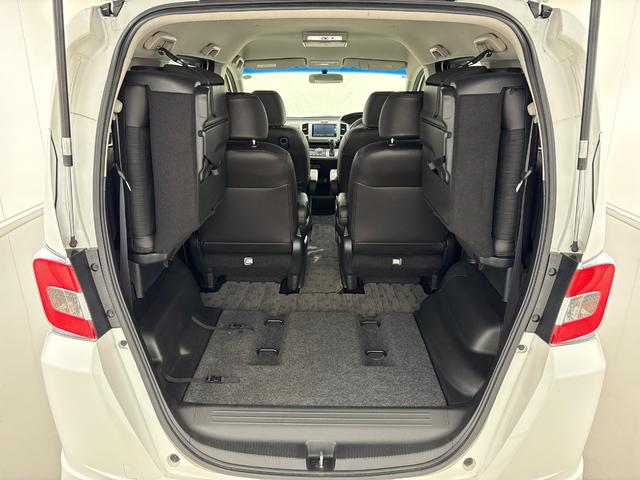 フリードハイブリッド ジャストセレクション 禁煙車 ワンオーナー 純正メモリーナビ リア席モニター リアカメラ 両側電動スライドドア 純正アルミホイール スマートキー ETC コンフォートビューパッケージ クルコン 本革巻ステアリングホイール(35枚目)