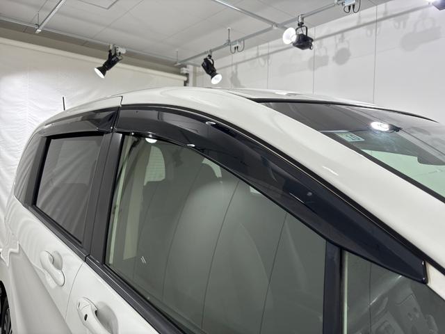 フリードハイブリッド ジャストセレクション 禁煙車 ワンオーナー 純正メモリーナビ リア席モニター リアカメラ 両側電動スライドドア 純正アルミホイール スマートキー ETC コンフォートビューパッケージ クルコン 本革巻ステアリングホイール(36枚目)