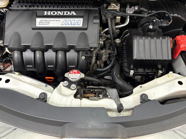 フリードハイブリッド ジャストセレクション 禁煙車 ワンオーナー 純正メモリーナビ リア席モニター リアカメラ 両側電動スライドドア 純正アルミホイール スマートキー ETC コンフォートビューパッケージ クルコン 本革巻ステアリングホイール(37枚目)