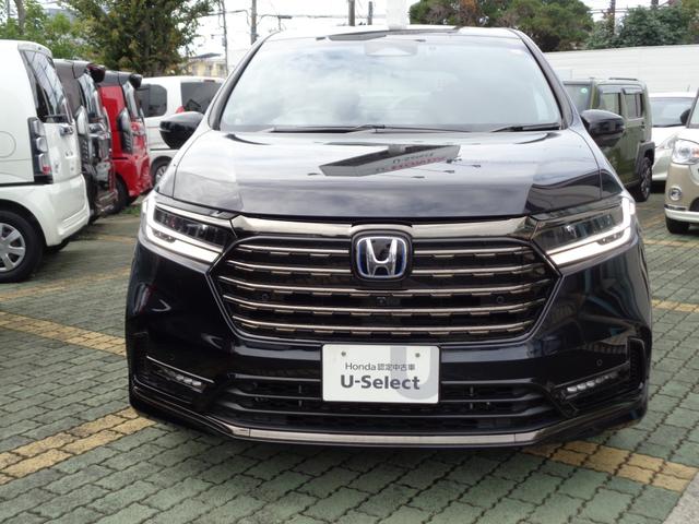 オデッセイハイブリッド ｅ：ＨＥＶアブソルート・ＥＸブラックエディション　当社デモカー　禁煙車　純正メモリーナビ　純正前後ドライブレコーダー　全周囲カメラ　レザーシート　前後シートヒーター　ＨｏｎｄａＳＥＮＳＩＮＧ　ＤＶＤ　ＣＤ　Ｂｌｕｅｔｏｏｔｈ　ＵＳＢ　パドルシフト（2枚目）