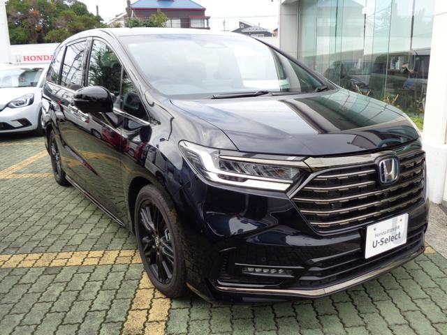 オデッセイハイブリッド ｅ：ＨＥＶアブソルート・ＥＸブラックエディション　当社デモカー　禁煙車　純正メモリーナビ　純正前後ドライブレコーダー　全周囲カメラ　レザーシート　前後シートヒーター　ＨｏｎｄａＳＥＮＳＩＮＧ　ＤＶＤ　ＣＤ　Ｂｌｕｅｔｏｏｔｈ　ＵＳＢ　パドルシフト（3枚目）