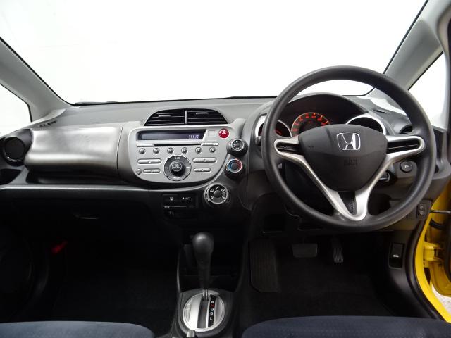 フィット G ETC CDチューナー イモビライザー キーレス フロアマット ワンオーナー 寒冷地仕様 安全ボディ 運転席助手席エアバッグ 盗難防止システム エアコン ABS パワーウィンドウ 1オーナー パワステ(11枚目)