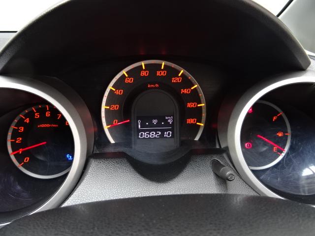 フィット G ETC CDチューナー イモビライザー キーレス フロアマット ワンオーナー 寒冷地仕様 安全ボディ 運転席助手席エアバッグ 盗難防止システム エアコン ABS パワーウィンドウ 1オーナー パワステ(12枚目)