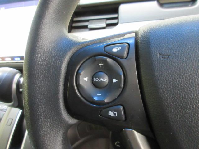 フリード Ｇ・ホンダセンシング　６人乗り仕様　禁煙車　純正９インチメモリーナビ　リアカメラ　ＣＤ　ＤＶＤ　Ｂｌｕｅｔｏｏｔｈ　両側電動スライドドア　ＥＴＣ　ＬＥＤヘッドライト　オートライト　ドアバイザー　ワンオーナー　Ｆセグ　ＶＳＡ（6枚目）