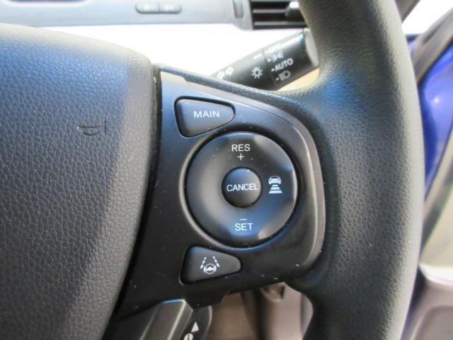 フリード Ｇ・ホンダセンシング　６人乗り仕様　禁煙車　純正９インチメモリーナビ　リアカメラ　ＣＤ　ＤＶＤ　Ｂｌｕｅｔｏｏｔｈ　両側電動スライドドア　ＥＴＣ　ＬＥＤヘッドライト　オートライト　ドアバイザー　ワンオーナー　Ｆセグ　ＶＳＡ（7枚目）