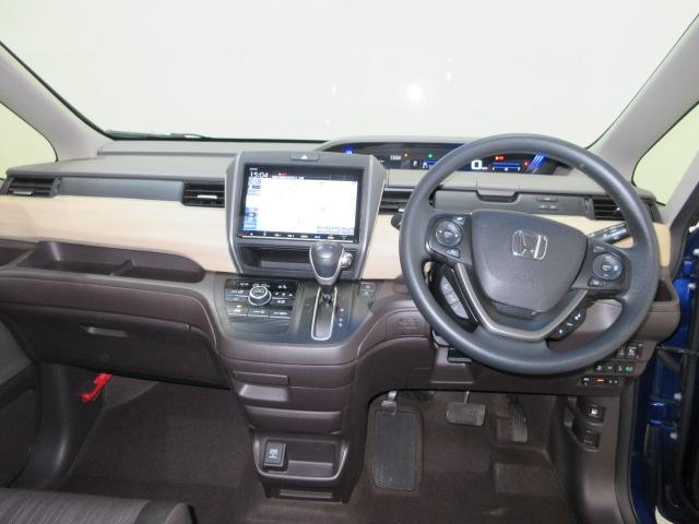 フリード Ｇ・ホンダセンシング　６人乗り仕様　禁煙車　純正９インチメモリーナビ　リアカメラ　ＣＤ　ＤＶＤ　Ｂｌｕｅｔｏｏｔｈ　両側電動スライドドア　ＥＴＣ　ＬＥＤヘッドライト　オートライト　ドアバイザー　ワンオーナー　Ｆセグ　ＶＳＡ（14枚目）