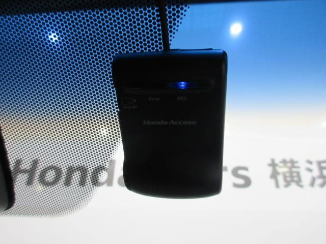 ステップワゴンスパーダ スパーダクールスピリットアドバンスパッケージα　８人　ＨｏｎｄａＳＥＮＳＩＮＧ　ドライブレコーダー　メモリーナビ　リアカメラ　後席モニター　シートヒーター　両側電動スライドドア　ＥＴＣ　純正アルミホイール　パドルシフト　ワンオーナー　フルセグ（5枚目）