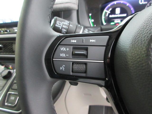 ステップワゴン ｅ：ＨＥＶエアーＥＸ　当社デモカー　８人　ＨｏｎｄａＳＥＮＳＩＮＧ　ドライブレコーダー　ギャザズ純正メモリーナビ　全周囲カメラ　フルセグＴＶ　ＥＴＣ　シートヒーター　純正アルミ　両側電動スライドドア　Ｂｌｕｅｔｏｏｔｈ（7枚目）