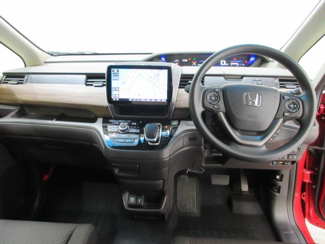 フリード＋ハイブリッド ハイブリッドＧ・ホンダセンシング　ワンオーナー　５人乗り　ホンダセンシング　社外ＳＤナビ　フルセグ　リアカメラ　ＤＶＤ　ＣＤ　ＢＴオーディオ　両側電動スライドドア　ＬＥＤヘッドライト　ドアバイザー　ＥＴＣ　スマートキー　衝突軽減　ＡＣ（14枚目）