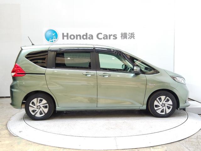 フリードハイブリッド ハイブリッド・Ｇホンダセンシング　６人　前後ドラレコ　メモリーナビ　リアカメラ　ＥＴＣ　ドアバイザー　軽減ブレーキ　キーフリーシステム　電動格納式ドアミラー　Ｂｌｕｅｔｏｏｔｈ音楽　１オ－ナ－　記録簿　ＤＶＤ再生可能　ＥＣＯＮ　禁煙（27枚目）