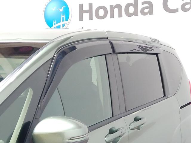 フリードハイブリッド ハイブリッド・Ｇホンダセンシング　６人　前後ドラレコ　メモリーナビ　リアカメラ　ＥＴＣ　ドアバイザー　軽減ブレーキ　キーフリーシステム　電動格納式ドアミラー　Ｂｌｕｅｔｏｏｔｈ音楽　１オ－ナ－　記録簿　ＤＶＤ再生可能　ＥＣＯＮ　禁煙（29枚目）