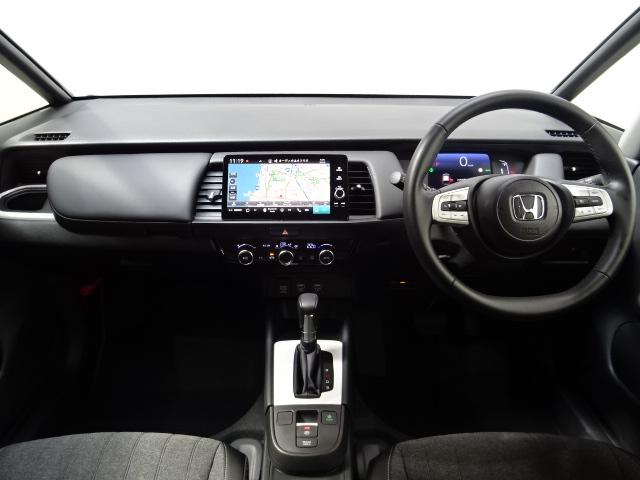 フィット e:HEVホーム 当社デモカー HondaSENSING メモリーナビ リアカメラ ETC Bluetooth USB LEDライト ETC2.0 前後誤発進抑制機能 クリソナ 助手席エアバッグ 運転席エアバッグ 禁煙(12枚目)