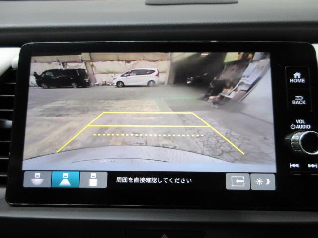 フィット ｅ：ＨＥＶホーム　前後ドラレコ　メモリーナビ　リアカメラ　ＥＴＣ２．０　ドアバイザー　ＨｏｎｄａＳＥＮＳＩＮＧ　ワンオーナー　前後誤発進抑制機能　クリソナ　助手席エアバッグ　運転席エアバッグ　１オナ　禁煙　ＬＥＤライト（4枚目）
