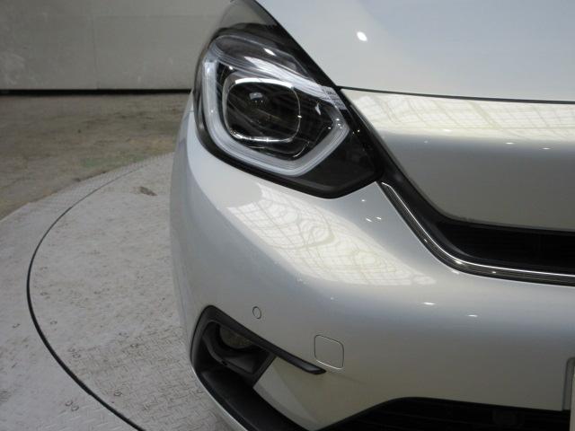 フィット ｅ：ＨＥＶホーム　前後ドラレコ　メモリーナビ　リアカメラ　ＥＴＣ２．０　ドアバイザー　ＨｏｎｄａＳＥＮＳＩＮＧ　ワンオーナー　前後誤発進抑制機能　クリソナ　助手席エアバッグ　運転席エアバッグ　１オナ　禁煙　ＬＥＤライト（22枚目）