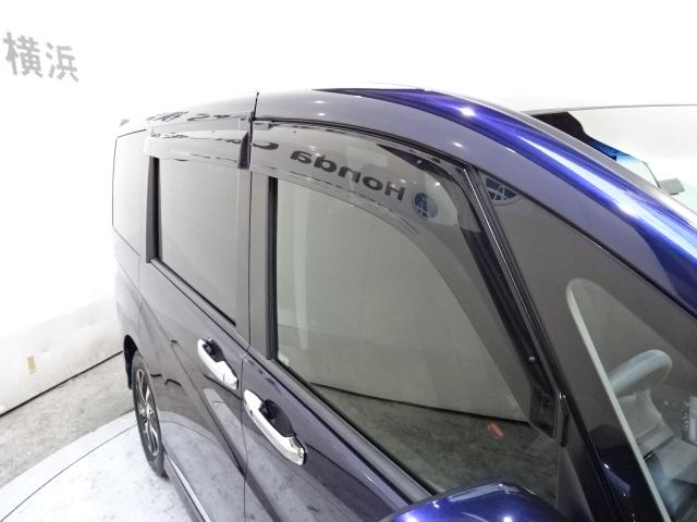 ステップワゴンスパーダ スパーダホンダセンシング　７人　ＨｏｎｄａＳＥＮＳＩＮＧ　メモリーナビ　リヤカメラ　フルセグＴＶ　Ｂｌｕｅｔｏｏｔｈ　ＥＴＣ　純正アルミホイール　ワンオーナー　ＬＫＡ　盗難防止　助手席エアバッグ　ワンオーナ－　Ｗパワスラ　禁煙（22枚目）