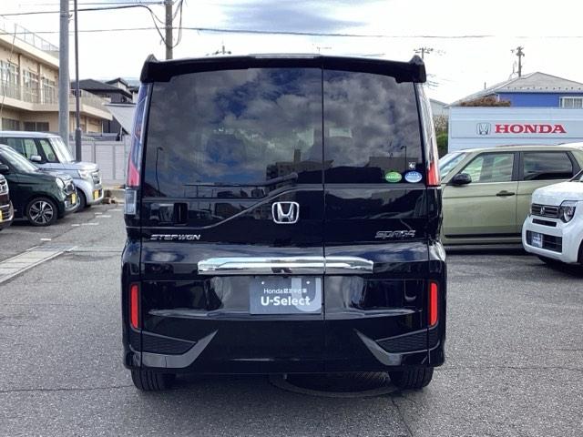 ステップワゴンスパーダ スパーダホンダセンシング 禁煙 盗難防止 助手席エアバッグ ワンオーナ- Wパワスラ メモリナビ 記録簿有 地デジ LEDライト 横滑り防止システム オートエアコン リアカメラ USB ナビ&TV 三列シート アイドリングS(4枚目)
