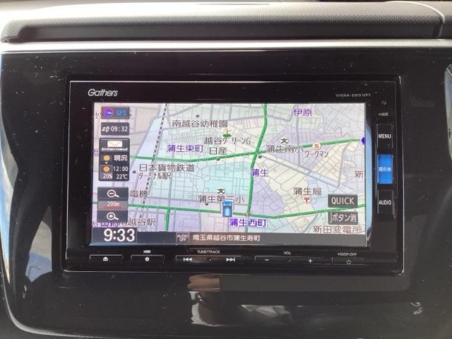 ステップワゴンスパーダ スパーダホンダセンシング 禁煙 盗難防止 助手席エアバッグ ワンオーナ- Wパワスラ メモリナビ 記録簿有 地デジ LEDライト 横滑り防止システム オートエアコン リアカメラ USB ナビ&TV 三列シート アイドリングS(7枚目)