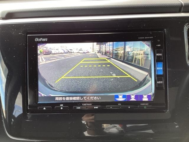 ステップワゴンスパーダ スパーダホンダセンシング 禁煙 盗難防止 助手席エアバッグ ワンオーナ- Wパワスラ メモリナビ 記録簿有 地デジ LEDライト 横滑り防止システム オートエアコン リアカメラ USB ナビ&TV 三列シート アイドリングS(8枚目)