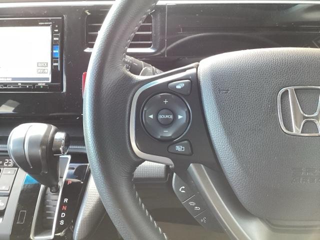 ステップワゴンスパーダ スパーダホンダセンシング 禁煙 盗難防止 助手席エアバッグ ワンオーナ- Wパワスラ メモリナビ 記録簿有 地デジ LEDライト 横滑り防止システム オートエアコン リアカメラ USB ナビ&TV 三列シート アイドリングS(12枚目)