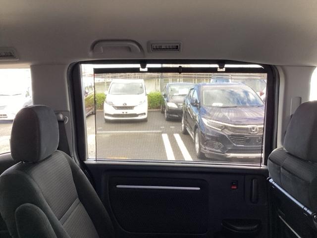 ステップワゴンスパーダ スパーダホンダセンシング 禁煙 盗難防止 助手席エアバッグ ワンオーナ- Wパワスラ メモリナビ 記録簿有 地デジ LEDライト 横滑り防止システム オートエアコン リアカメラ USB ナビ&TV 三列シート アイドリングS(21枚目)