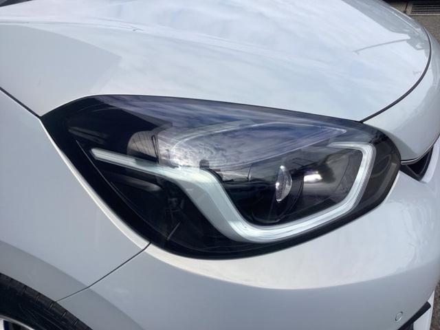 フィット e:HEVホーム 元デモカー 助手席エアバッグ 運転席エアバッグ アイドリングストップ 禁煙 LEDライト USB接続 バックカメラ ABS サイドエアバッグ オートクルーズコントロール フルセグTV DVD再生(28枚目)