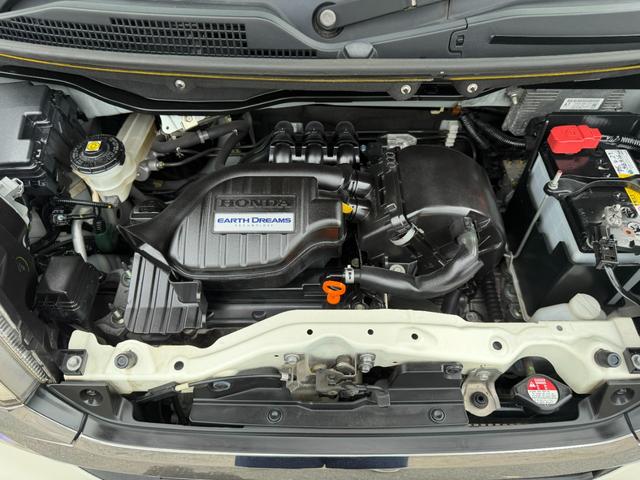 N-BOXカスタム G・Lパッケージ ワンオーナー・7インチ純ナビTV・Rカメラ・左パワスラ・HID・オートライト アイドリングストップ車 1オーナー ナビ・TV スマキ- フロントベンチシート 両側スライドドア パワーウィンドウ ABS(59枚目)