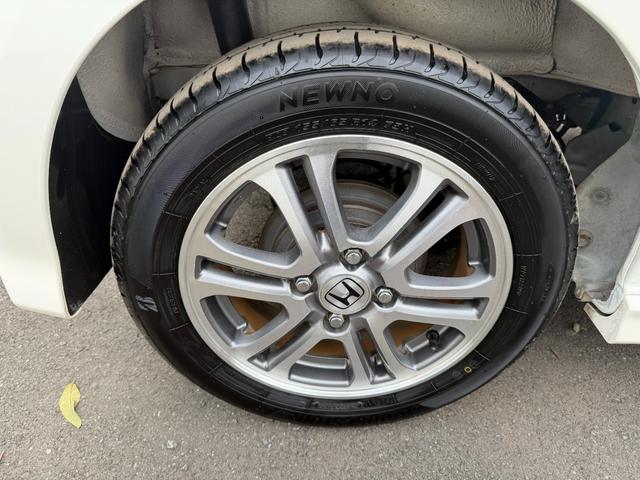 N-BOXカスタム G・Lパッケージ ワンオーナー・7インチ純ナビTV・Rカメラ・左パワスラ・HID・オートライト アイドリングストップ車 1オーナー ナビ・TV スマキ- フロントベンチシート 両側スライドドア パワーウィンドウ ABS(62枚目)