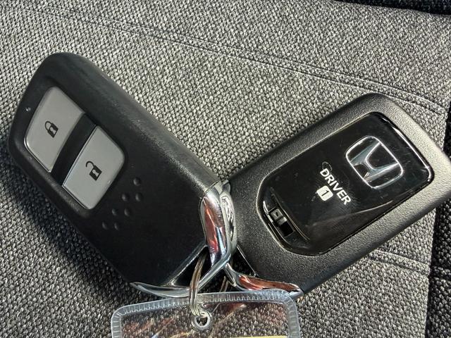 フィット e:HEVホーム 4WD・禁煙・ワンオーナー・ドラレコ・障害物センサー・7インチ純ナビTV・Bluetooth・ホンダコネクト・Rカメラ・ETC・LED・オートハイビーム・純AW リヤカメラ VSA 前後ソナー(22枚目)
