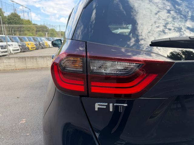 フィット e:HEVホーム 4WD・禁煙・ワンオーナー・ドラレコ・障害物センサー・7インチ純ナビTV・Bluetooth・ホンダコネクト・Rカメラ・ETC・LED・オートハイビーム・純AW リヤカメラ VSA 前後ソナー(34枚目)