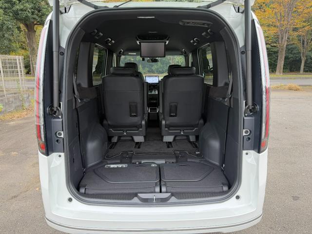 ステップワゴン ｅ：ＨＥＶスパーダプレミアムライン　禁煙・ワンオーナー・ドラレコ・障害物センサー・１１．４インチ純ナビＴＶ・Ｂｌｕｅｔｏｏｔｈ・ホンダコネクト・マルチビューカメラ・ＥＴＣ・シートヒーター・オットマン・パドルシフト・ＡＷ　マルチカメラ（70枚目）