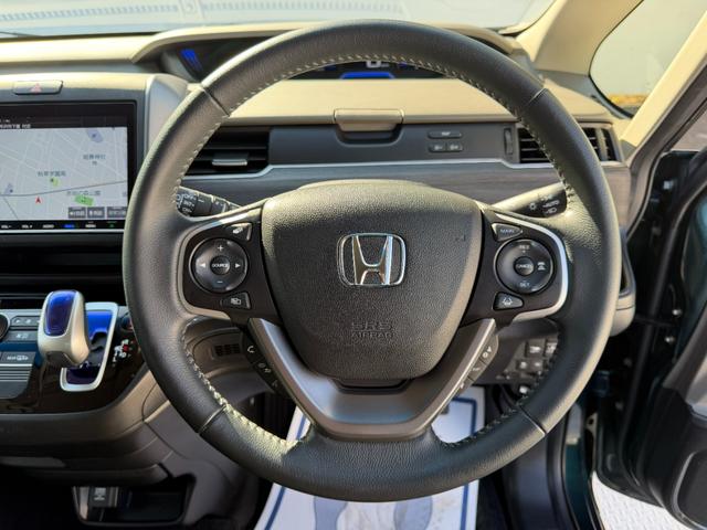 フリードハイブリッド ハイブリッド・Ｇホンダセンシング　禁煙・ワンオーナー・ドラレコ・９インチ純ナビＴＶ・Ｂｌｕｅｔｏｏｔｈ・インターナビ・Ｒカメラ・ＥＴＣ・両パワスラ・スマートキー・ＬＥＤ　軽減ブレーキ　キーフリーシステム　１オ－ナ－　記録簿　ＥＣＯＮ（40枚目）