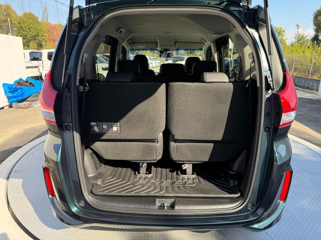 フリードハイブリッド ハイブリッド・Ｇホンダセンシング　禁煙・ワンオーナー・ドラレコ・９インチ純ナビＴＶ・Ｂｌｕｅｔｏｏｔｈ・インターナビ・Ｒカメラ・ＥＴＣ・両パワスラ・スマートキー・ＬＥＤ　軽減ブレーキ　キーフリーシステム　１オ－ナ－　記録簿　ＥＣＯＮ（63枚目）