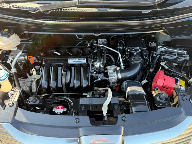 フリードハイブリッド ハイブリッド・Ｇホンダセンシング　禁煙・ワンオーナー・ドラレコ・９インチ純ナビＴＶ・Ｂｌｕｅｔｏｏｔｈ・インターナビ・Ｒカメラ・ＥＴＣ・両パワスラ・スマートキー・ＬＥＤ　軽減ブレーキ　キーフリーシステム　１オ－ナ－　記録簿　ＥＣＯＮ（65枚目）