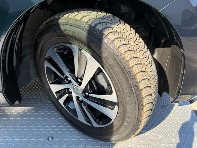 フリードハイブリッド ハイブリッド・Ｇホンダセンシング　禁煙・ワンオーナー・ドラレコ・９インチ純ナビＴＶ・Ｂｌｕｅｔｏｏｔｈ・インターナビ・Ｒカメラ・ＥＴＣ・両パワスラ・スマートキー・ＬＥＤ　軽減ブレーキ　キーフリーシステム　１オ－ナ－　記録簿　ＥＣＯＮ（67枚目）