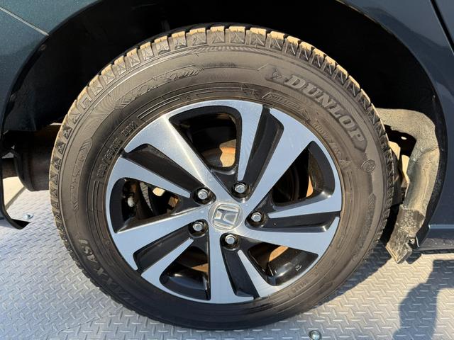 フリードハイブリッド ハイブリッド・Ｇホンダセンシング　禁煙・ワンオーナー・ドラレコ・９インチ純ナビＴＶ・Ｂｌｕｅｔｏｏｔｈ・インターナビ・Ｒカメラ・ＥＴＣ・両パワスラ・スマートキー・ＬＥＤ　軽減ブレーキ　キーフリーシステム　１オ－ナ－　記録簿　ＥＣＯＮ（68枚目）