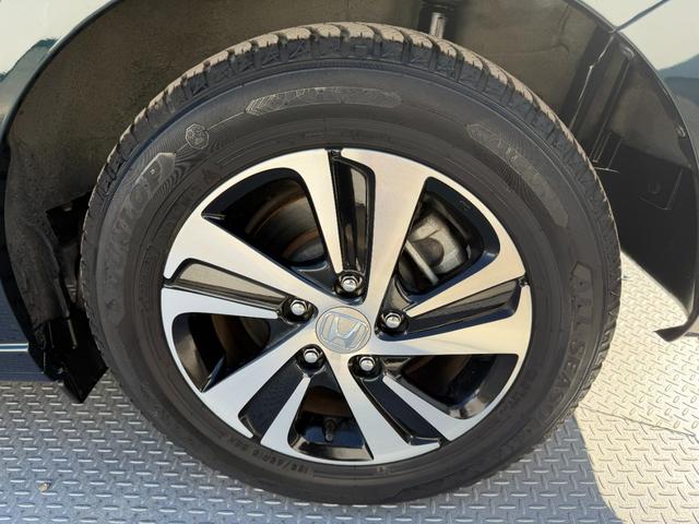 フリードハイブリッド ハイブリッド・Ｇホンダセンシング　禁煙・ワンオーナー・ドラレコ・９インチ純ナビＴＶ・Ｂｌｕｅｔｏｏｔｈ・インターナビ・Ｒカメラ・ＥＴＣ・両パワスラ・スマートキー・ＬＥＤ　軽減ブレーキ　キーフリーシステム　１オ－ナ－　記録簿　ＥＣＯＮ（69枚目）