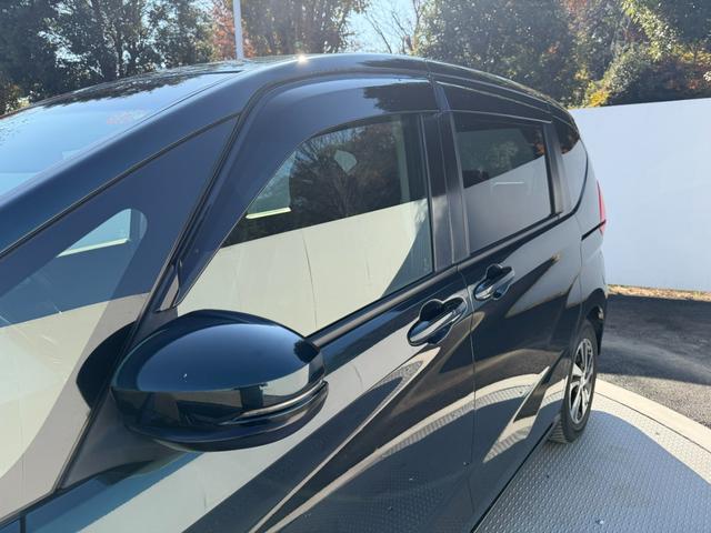 フリードハイブリッド ハイブリッド・Ｇホンダセンシング　禁煙・ワンオーナー・ドラレコ・９インチ純ナビＴＶ・Ｂｌｕｅｔｏｏｔｈ・インターナビ・Ｒカメラ・ＥＴＣ・両パワスラ・スマートキー・ＬＥＤ　軽減ブレーキ　キーフリーシステム　１オ－ナ－　記録簿　ＥＣＯＮ（73枚目）