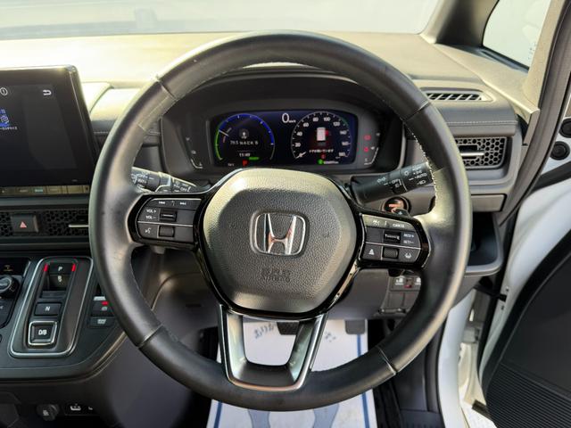 ステップワゴン e:HEVスパーダ ワンオーナー・障害物センサー・9インチ純ナビTV・Bluetooth・ホンダコネクト・Rカメラ・ETC・デュアルAAC・両パワスラ・オットマン・AW 1オーナー デュアルエアコン フルオートエアコン(41枚目)